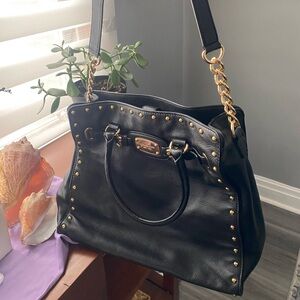 Michael kors - gently used - studded , black leather